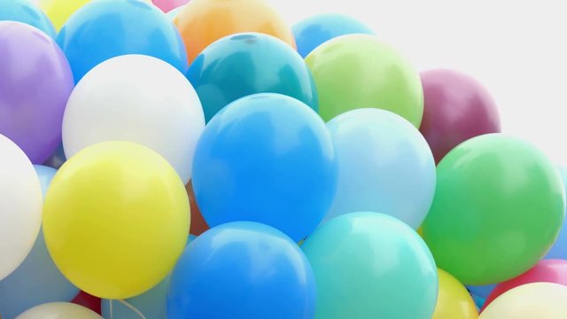 Festive balloons fastened together.
