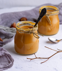 Caramel dessert Toffee in a glass jar