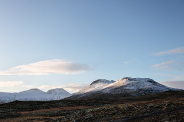 Fototapeta premium Mountain road leadi.ng to the peaks in Iceland