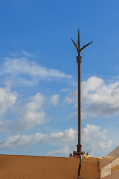 Lightning Rod against Blue Sky Background