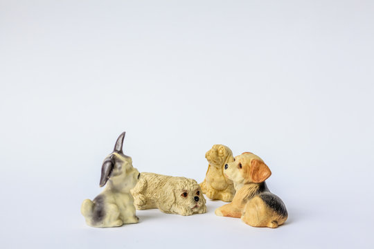 Decorative porcelain dogs isolated on a white background