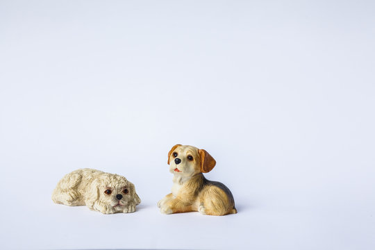 Decorative porcelain dogs isolated on a white background