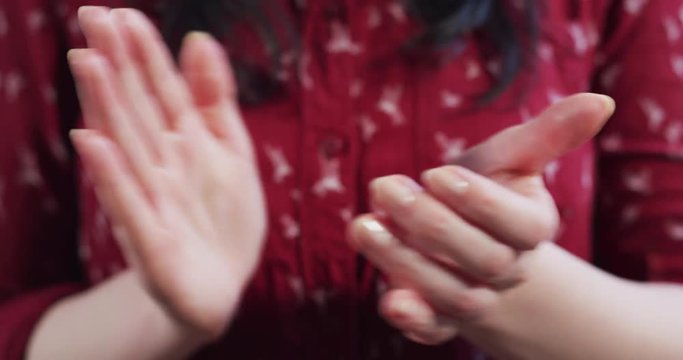 Woman applauding