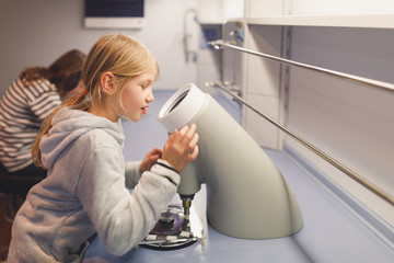 Two young girls working in a resarch centre for children