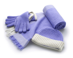set of winter blue woolen accessorie, scarf, gloves and hat, isolated
