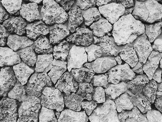 Grey monochrome rokc vintage background. Abstract wall background from rock  Texture.