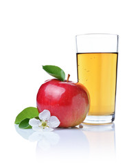 Glass of fresh organic juice and red apple with leaves and spring flower