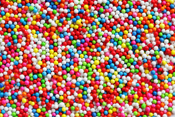 Fototapeta na wymiar close up of colorful sprinkle sugar background.