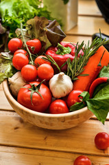 Fresh vegetables in basket on wooden background. Healthy lifestyle, organic food concept. Farmers Vegetable Market,vegetarian