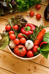 Top view, fresh vegetables in basket on wooden background. Healthy lifestyle, organic food concept. Farmers Vegetable Market,vegetarian