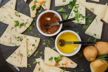 Traditional italian aperitif with proscioutto, mortadella sausage, cheese and aperol spritz drink