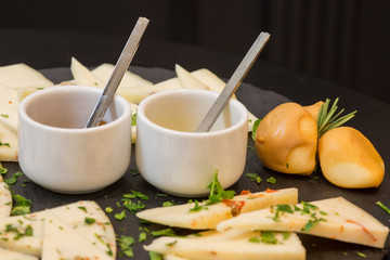 Traditional italian aperitif with proscioutto, mortadella sausage, cheese and aperol spritz drink