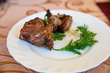 Freshly cooked grilled meat on plate close