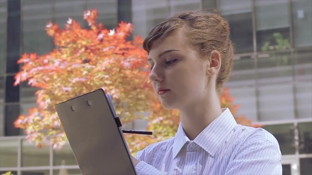 Woman Office worker smiles at camera