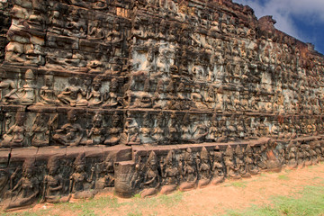 Carving details of the Terrace of the Leper King Thom complex in the Angkor Area, near Siem Reap, Cambodia, Asia. Detail of a Buddhist monastery from the 12th century. Asian architectural background.