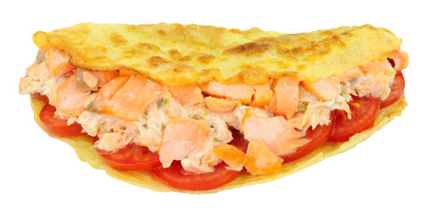 Salmon and cream cheese filled omelette isolated on a white background