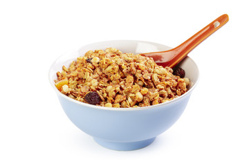 Bowl of homemade granola with fruit pieces isolated on white
