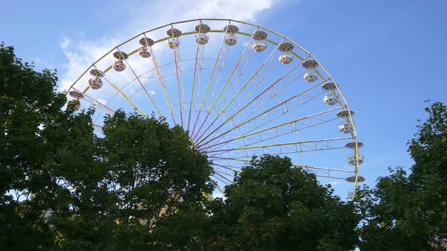 Professional video of giant ferris wheel in Paris in 4K Slow motion 60fps