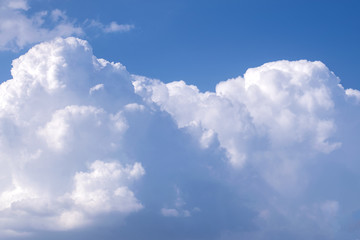 .Beautiful big white clouds in a bright blue sky.