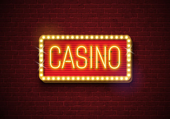Obraz premium Casino neon sign illustration on brick wall background. Vector light banner or bright signboard design.