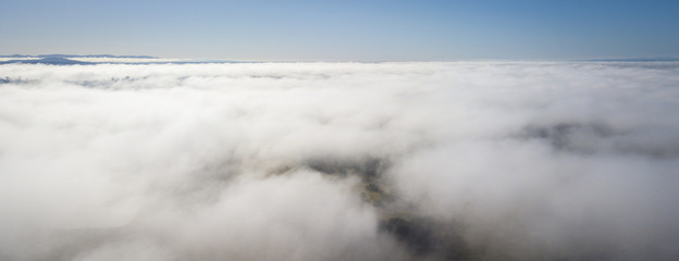 Aerial drone view of a foggy morning in the Scenic Rim, Queensland, Australia