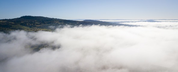 Aerial drone view of a foggy morning in the Scenic Rim, Queensland, Australia