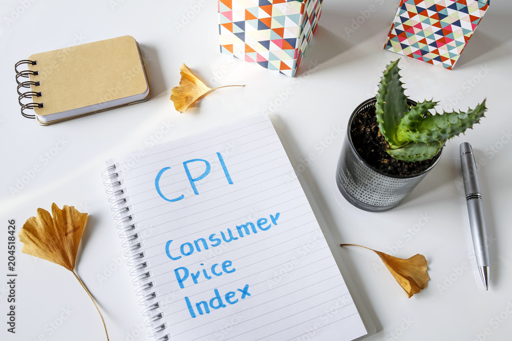 Poster cpi consumer price index written in notebook on white table