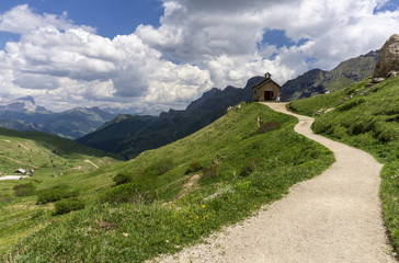 A small church in the Dolomites. Viewpoint Passo Pordoi. Italy.
