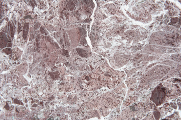 Dettaglio da vicino di marmo rosso con venature bianche