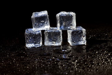 ice cubes on black background.