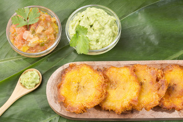 Patacón fried flattened pieces of green plantain (tostón, tachino) © Luis Echeverri Urrea