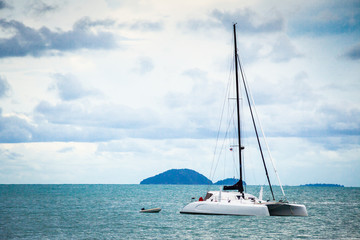 Yacht drifting in the ocean Bay