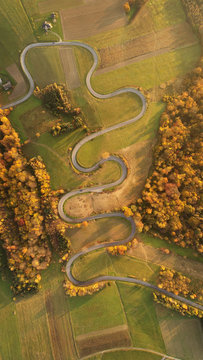 Aerial landscape - windy road in autumn scenery