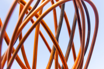 Copper wire against the blue sky