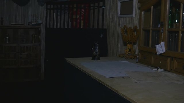 A dark room in an escape room game with unique pirates theme 