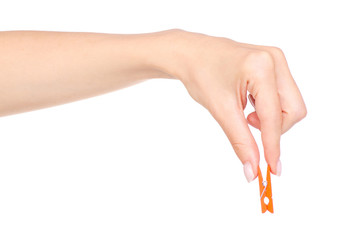 The colorful stationery clothespins in hand