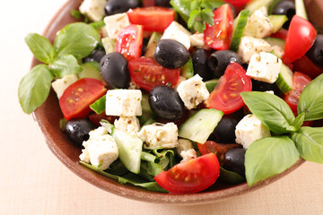 salad with feta, tomato, olive and basil