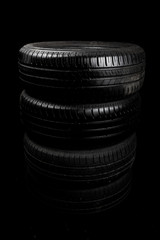 Car tyre isolated on a black background
