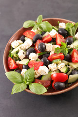 salad with feta, tomato, olive and basil