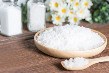 Sea salt in wood plate.