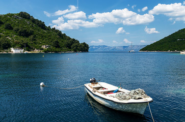 Fototapeta na wymiar Fishing boat at sea.Boat at beautiful blue water