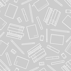 Books and stationery random on gray background.