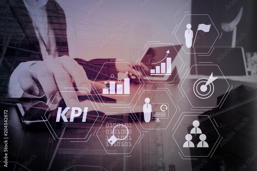 Poster businessman working with smart phone and digital tablet and laptop computer in modern office with lo