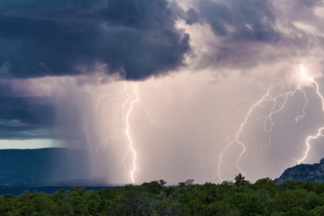 Thunderstorm lightning bolts and heavy rain