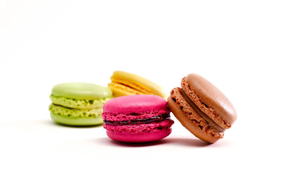 Fresh bright colored Macarons insolated on white background
