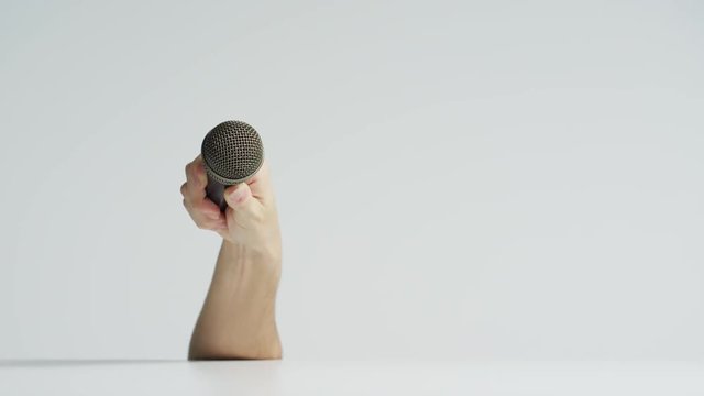 Raising hand with a microphone