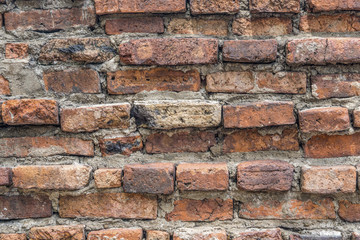 Old vintage orange brick wall background texture.