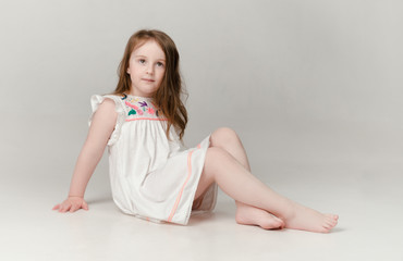 child in the Studio posing in fashionable clothes