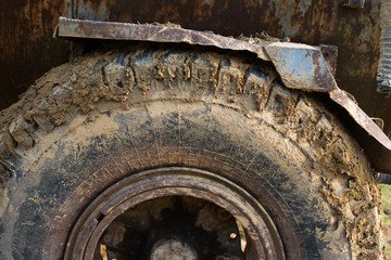 Muddy wheels of the big truck.