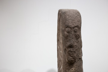 Ancient stone stele with an image of male faces belonging to the Okunev culture is a Bronze Age culture dated to the first half of the 2nd millennium BC in Minusinsk Hollow of southern Siberia.